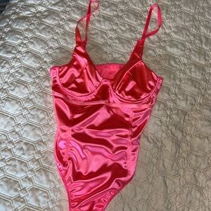 Hot pink body suit